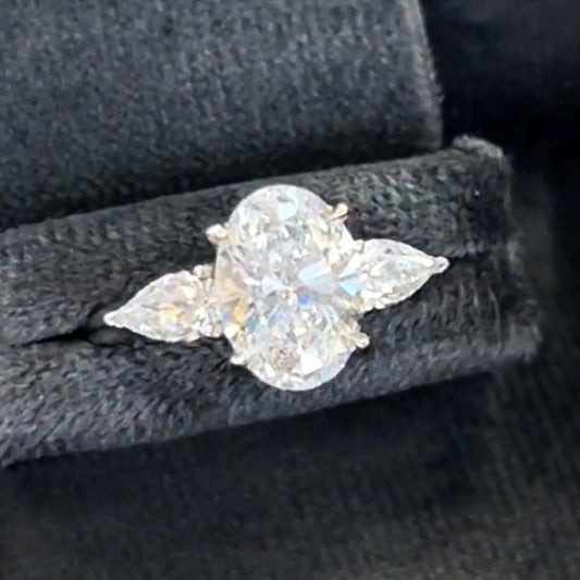 Sparkly 4ct Oval Cut Centered with Two Pear Cut White Sapphire Women's Engagement Ring in Silver-JEWELBUYS