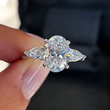Sparkly 4ct Oval Cut Centered with Two Pear Cut White Sapphire Women's Engagement Ring in Silver-JEWELBUYS
