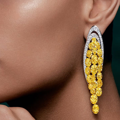 Oval-shaped spiral ring and earrings with vibrant yellow gemstones-JEWELBUYS