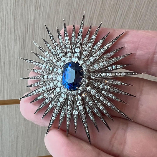 8.97ct oval blue gemstone sunburst brooch -JEWELBUYS
