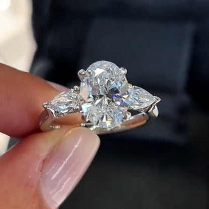 Sparkly 4ct Oval Cut Centered with Two Pear Cut White Sapphire Women's Engagement Ring in Silver-JEWELBUYS