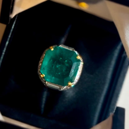 A classic and exquisite ring featuring a dazzling 10.8Ctw emerald and multi-shaped sapphires-JEWELBUYS