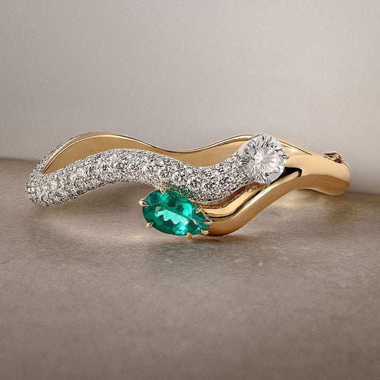 A captivating pear-shaped emerald and classic round double sapphire bracelet ring-JEWELBUYS