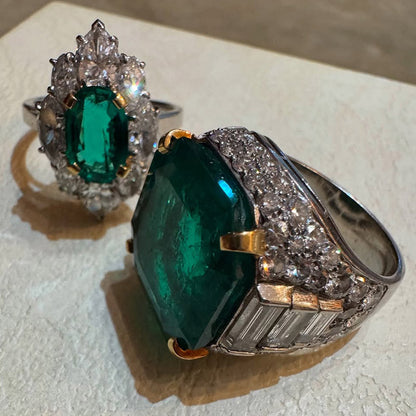 A classic and exquisite ring featuring a dazzling 10.8Ctw emerald and multi-shaped sapphires-JEWELBUYS