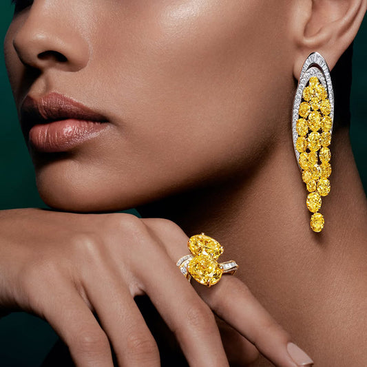 Oval-shaped spiral ring and earrings with vibrant yellow gemstones-JEWELBUYS